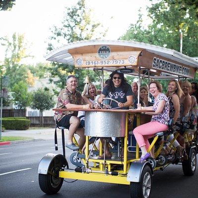 Pedal, Drink, and Bar hop through Sacramento on a 15 seat Beer Bike