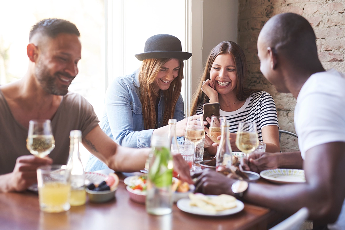 People eating food at a table