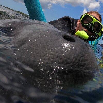 VIP Private Boat Manatee Snorkel Tour with In-Water Guide and Photograper