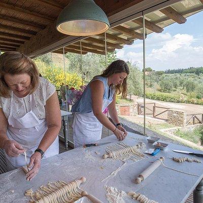 Cooking Class and Lunch at a Tuscan Farmhouse with Local Market Tour from Florence