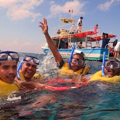 Cozumel Coral Reef Snorkeling by Glass Bottom Boat with Guide